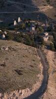 An aerial view of a large building with a road video