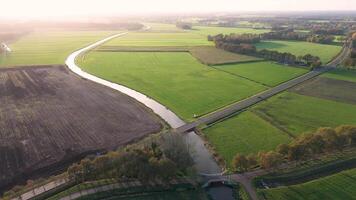 An aerial view of a river and fields video