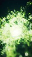 Green flowing particles with explosive wave effect, 3d rendering. video