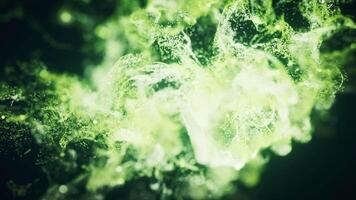 Green flowing particles with explosive wave effect, 3d rendering. video