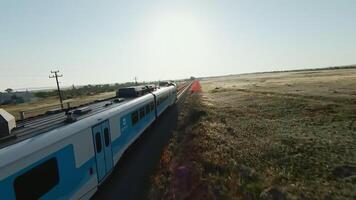 Experience a Scenic Train Journey That Takes You Through Beautiful Open Fields and Landscapes. Media video