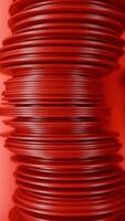 Abstract rows of red round discs slowly moving like snakes. Design. 3D columns of flat round discs. video