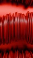 Abstract rows of red round discs slowly moving like snakes. Design. 3D columns of flat round discs. video