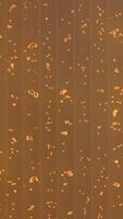 Close up of underwater view of air bubbles in colored liquid substance. Clip. Vertical bubbles flow in water. video