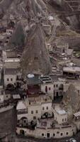 Top view of old Cappadocia Park in Turkey. Action. Stone houses and buildings in rocks. Goreme National Park and the cave buildings of Cappadocia video