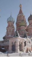 St. Basil's Cathedral on sunny winter day. Action. Bright temple on Red Square in Moscow. Monument of Russian architecture-St. Basil's Cathedral video