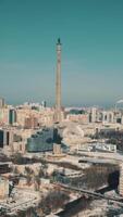 Demolition of the unfinished TV tower by a directional explosion with collapse of the structure, Ekaterinburg, Russia. . Aerial view of a cityscape in the summertime. video