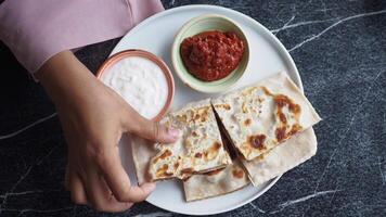 Enjoy the delicious Indian flatbreads with yogurt and savory salsa dips that enhance flavor video