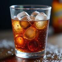A close-up photo of glass of cola