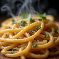 A close-up photograph of a dish of garlic pasta photo