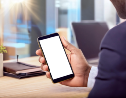 Man Holding Smartphone With Digital Wallet Interface in Modern Office Setting png