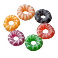 Assorted round candies in multiple colors on transparent background png