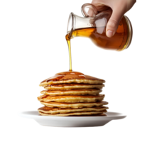 Pancakes with syrup being poured isolated on a transparent background png