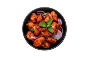 Tandoori chicken pieces in a bowl on a transparent background png