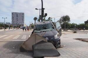 VALENCIA, SPAIN OCTOBER 31, 2024. Wrecked car and debris illustrating the devastating aftermath of flooding in Valencia, Spain photo
