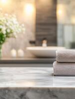 For product display, an empty marble top table with a blurred background of a bathroom photo