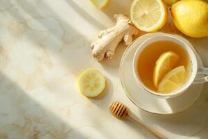 A soothing cup of ginger tea with lemon and honey on a light background, ideal for product placement and text overlay photo