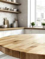 Beautiful round wood tabletop counter inside, empty, with a bright, clean kitchen background. Ideal for banners and product montage displays. photo