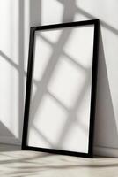minimalist black frame mockup with shadow on a white background photo