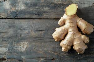 A high-resolution image of a fresh ginger root on a rustic wooden background, perfect for product placement and text overlay photo