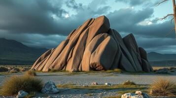 A rock formation in the middle of a desert photo