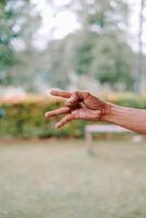 hand fingers displaying various symbols and number or gestures photo