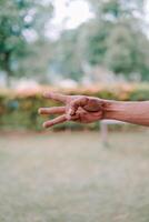 hand fingers displaying various symbols and number or gestures photo