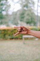 hand fingers displaying various symbols and number or gestures photo