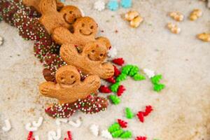 Gingerbread man ginger cookies christmas party delicious dessert christmas treat fresh delicious gourmet food background on the table rustic copy space top view photo