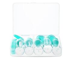 Travel toiletry kit with various-sized bottles and containers in a clear zip bag photo
