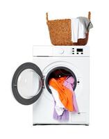 White Front Load Washing Machine With Clothes Inside and Laundry Detergent photo