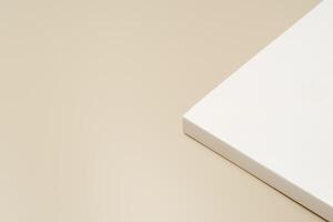 Stack of blank paper on beige background photo