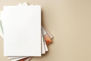 Stack of blank paper on beige background photo