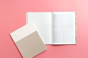 A Collection of Blank Papers Stacked on a Pink Surface for Creative Projects photo