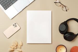 Blank stack of paper on beige background top view photo