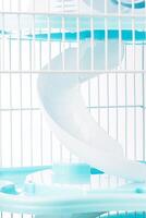 Pet cage showcases a neat design and easy access for small animals in a bright setting photo