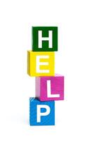 wooden toy cubes with letters. Help photo