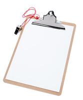 A blank clipboard and a coaches whistle with copy space photo