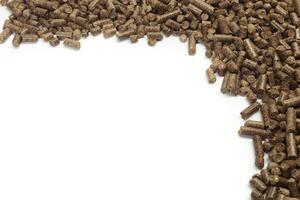 stack of wooden pellets for bio energy, white background, isolated photo