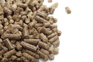 stack of wooden pellets for bio energy, white background, isolated photo