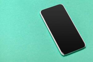Black smartphone on the table photo