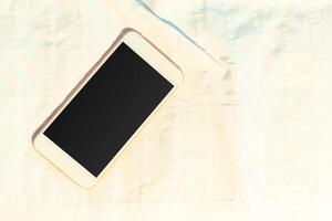 Top view smartphone mock up template with black screen photo