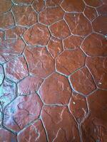 Close-up of cement walkway texture for home background. photo