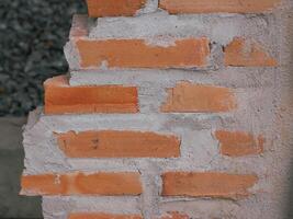 Old orange brick texture vintage wall for background photo
