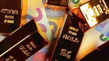 Shiny Gold Bars on the 20 Euro Bills - Top View. Euro Money Currency. A Lot of Twenty Euro Banknotes. Success, Finances and Wealth Concept - Slow Rotation Right video