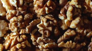 Scattered Shelled Walnuts - Top View, Rotating. Turning Walnut Background. Natural High-Calorie Snacks - Rotation video