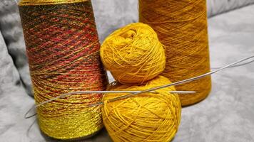 Orange threads for handicrafts. Selecting a color palette for knitting. Autumn photo