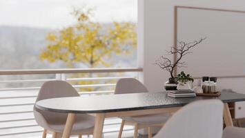 A close-up of a modern dining table by the window in a contemporary white dining room. photo