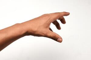 Outstretched hand of a Latino man with open fingers, isolated on white background. Gesture indicating gripping or signaling, ideal for interaction and communication concepts. Close-up view showing photo