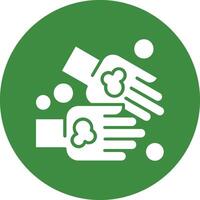 A green and white icon of two hands washing each other vector